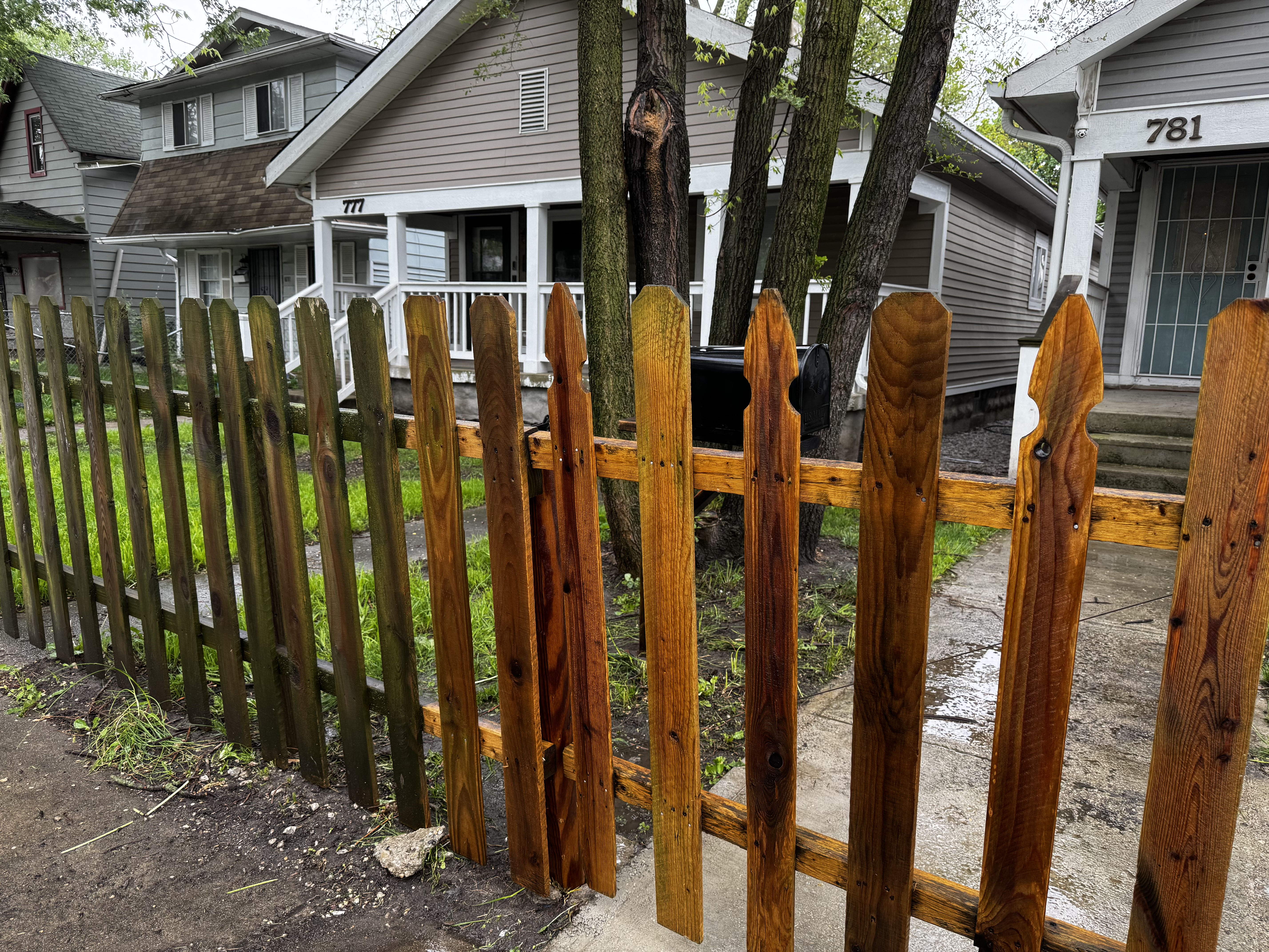 Fence after cleaning — wood restored